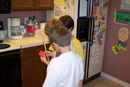 Patrick, John and Zach working out the riddle