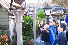 Ringing the bell at the oldest school house