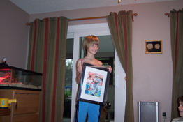 Alex was thrilled with an autographed picture of Peyton Manning
