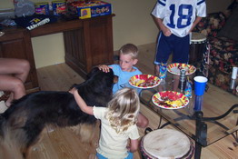 Preston and Danielle petting Isabelle