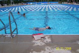 Practicing floating on his back