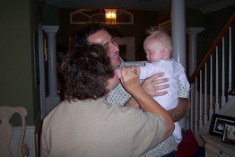 Mark's Aunt Pat and cousin, Jim, say hello to Caroline