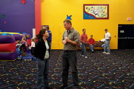 Stacy and KC having an adult conversation - about kids, no doubt!