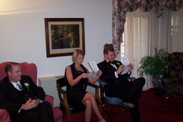 Stacey and Jay reading the programs