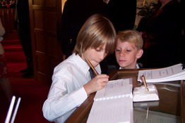 Preston was supervising Alex signing the guest book