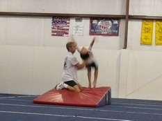 Working on his back handspring