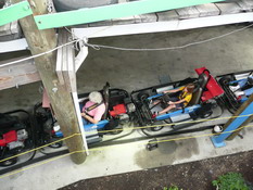 Mom and Alex getting strapped into their go-karts
