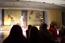 Alex as Lt. Ward talking to Annie