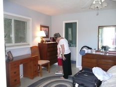Nana was showing Patch how to use the scale so they could weigh the fish
