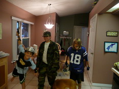 Patrick is a night (partial costume), Alex is a football player (surprise) and Steven (our neighbor - in the middle) is a soldier