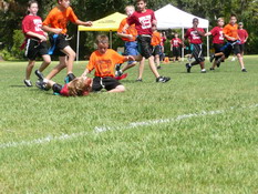 That's Alex on his back holding the football