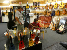 Trying out the guitar at the store
