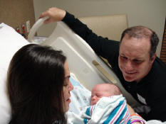 He's got his daddy's hairline.  :-)