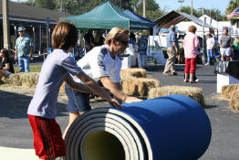 Patrick helping Scott set up the mat