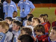 Alex is right in the middle with the black skull cap
