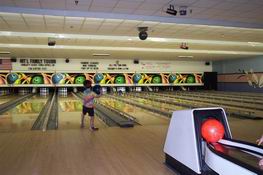He's bowling overhand!  I guess he's been watching too much baseball!