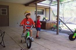 Carter graciously (NOT!) shared his bike with Patrick
