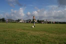 He still remembers how to kick the ball - whew!