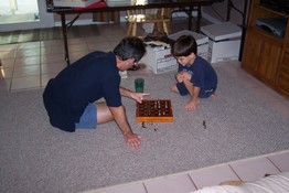 Mark and Patch discussing chess strategy