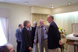 I'm not sure who everone is, but in the middle is Mark's dad, and Mark's uncle is on the left