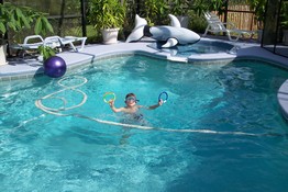Alex showing off the dive rings he retrieved