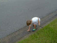 Alex was racing blades of grass downstream