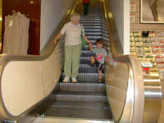 Patch waiting to step off the escalator