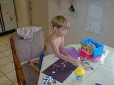 Alex making Grandma's birthday card
