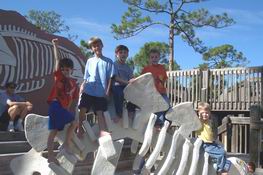 Patrick, Alex, Carter, Nathan and Andrew on the stegasaurus skelaton