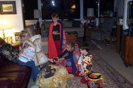 Presenting the gifts - yes, Alex is holding a cell phone as his gift!