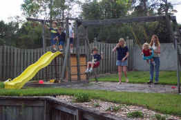 Jacob, Carter and Clara at the slide.  Mommy and Patch and Mary and Clara at the swings.