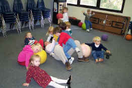 That's their teacher they're all piling on top of!