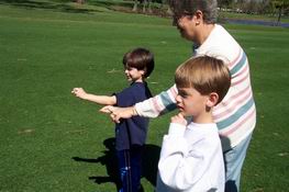 Nana and the boys crossing their fingers for Uncle John