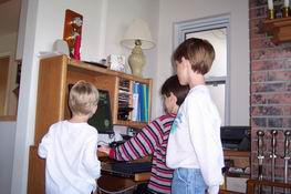 Preston, Alex and Patch playing computer golf
