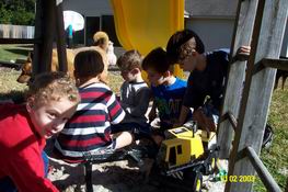 Men at work.  (Doesn't Nathan look devilish!)