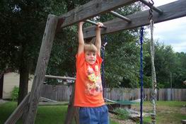 Catch me, Mom!  (He's not exactly the daredevil of the two)