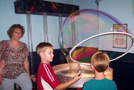 Anthony is surrounding Alex with a huge bubble!