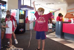 Alex draped in tickets
