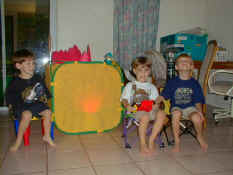 Patrick, Jacob and Alex by the campfire