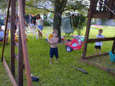 Alex swinging at the pinata