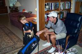 John gave Alex a set of new clubs and a new bag!!!!!