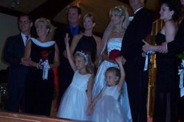 The photographer was waving to get the girls attention - the girls waved back!
