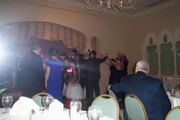 The wedding party made a big circle on the dance floor while Mike and Mary Beth danced in the middle