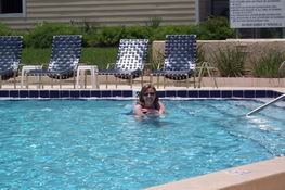 Mommy floating around on a beach ball