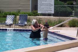 My aunt helping Patch with his snorkel