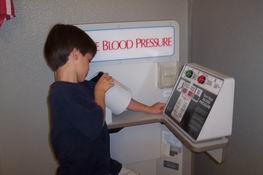 Patch loves to check his blood pressure at the store
