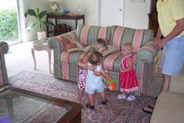 Ryan getting a hug from Julia while Kate watches