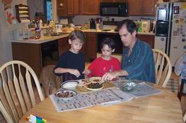 Mark and the boys made their own pizzas tonight.