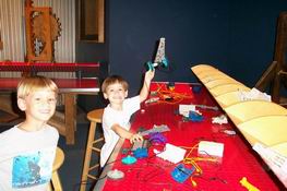 The boys are very proud of their robot creations