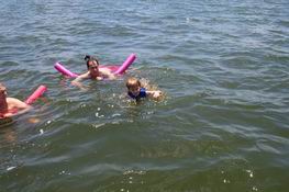 Even though he had his life jacket on, Alex was swimming really well